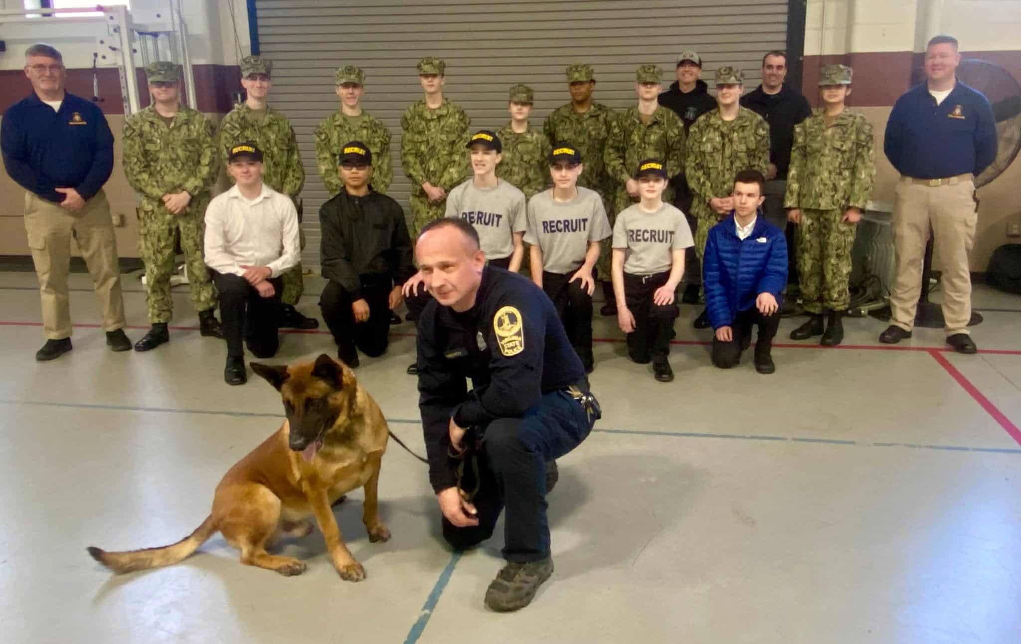 Full unit photo with K9 officer and police dog