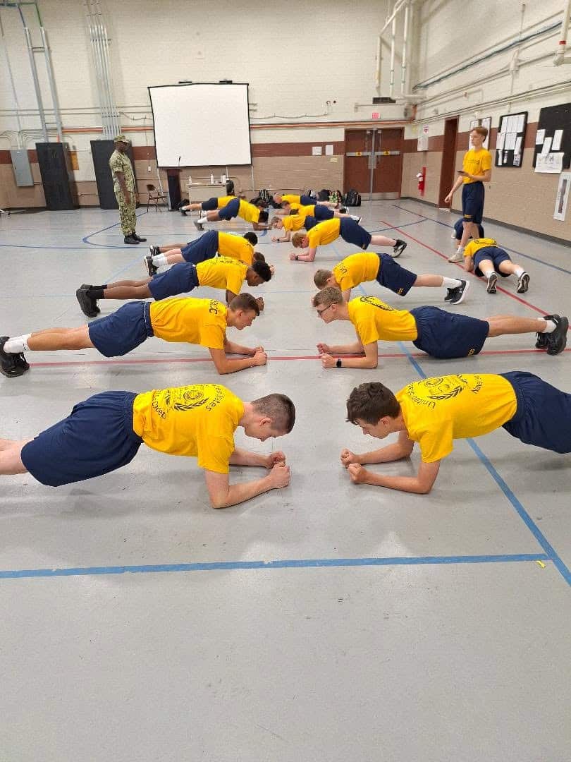 Sea Cadets doing physical training together in the gym
